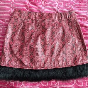 Dolls Kill Pink Snake Print Mini Skirt with Black Fur Trim